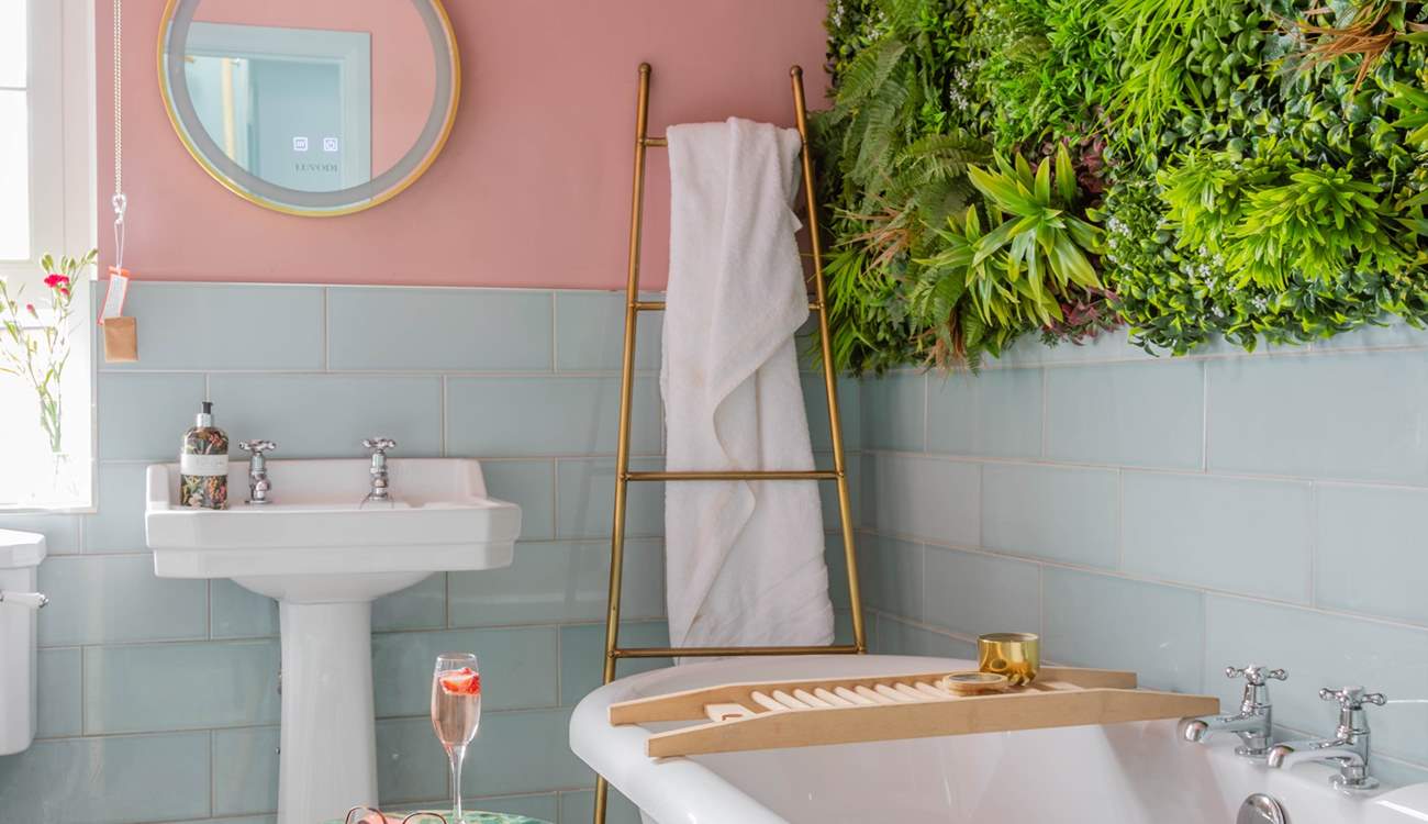 The family bathroom is home to this beautiful roll-top bath.