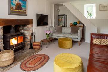 Light the fire and relax in the beautiful sitting-room. Please be aware that the stairs are open-sided so do take care.