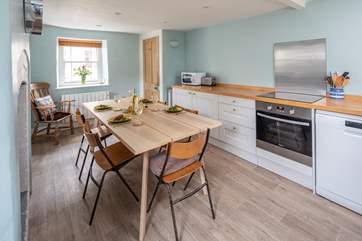 The kitchen/dining-room has a lovely country feel.