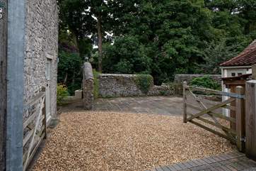 A view of the private driveway where there is plenty of space for two cars.