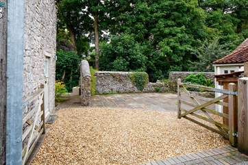 A view of the private driveway where there is plenty of space for two cars.