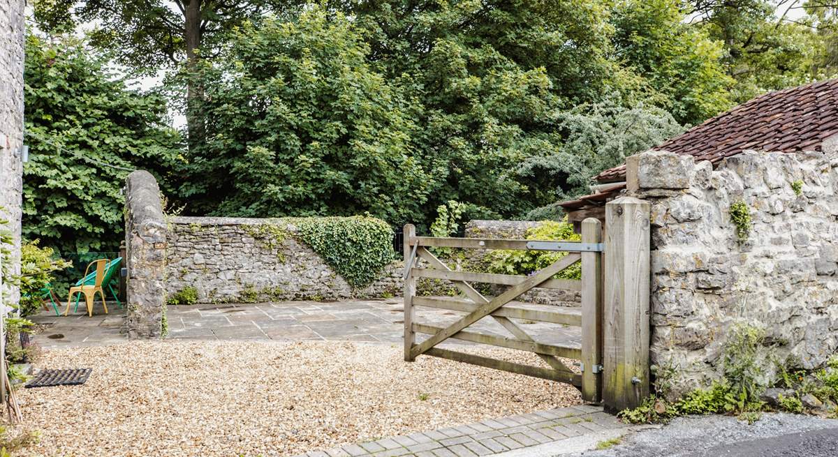 A view of the private driveway where there is plenty of space for two cars.