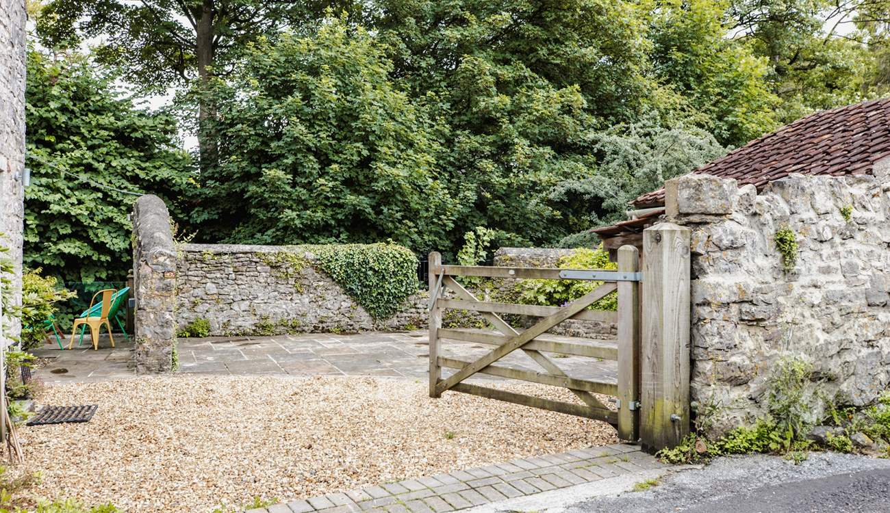 A view of the private driveway where there is plenty of space for two cars.