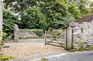 A view of the private driveway where there is plenty of space for two cars.