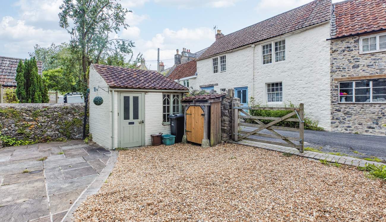 This sweet outhouse is a handy space to leave wellies and coats.