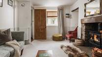 Light the fire and relax in the beautiful sitting-room. Please be aware that the stairs are open-sided so do take care.