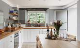 Whether you are enjoying a family feast, or a board game evening, the kitchen/dining-room is a really sociable space. - Thumbnail Image