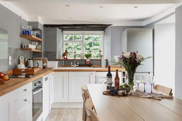 Whether you are enjoying a family feast, or a board game evening, the kitchen/dining-room is a really sociable space.