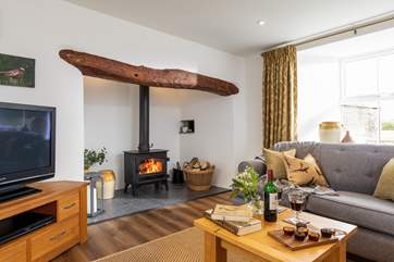 The sitting-room is a relaxing space at any time of the year.