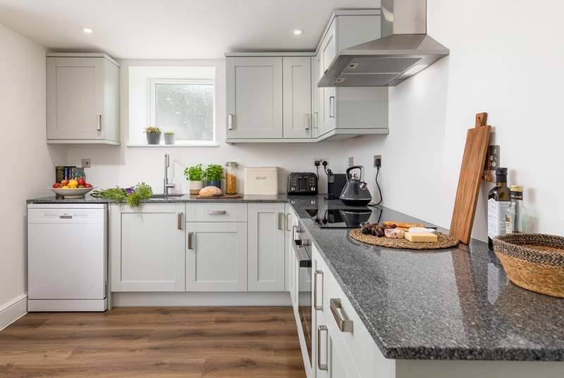 The stylish kitchen is equipped with everything you need to rustle up a snack or three course dinner.