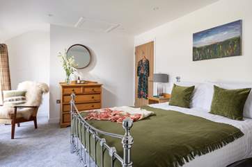 The gorgeous double bedroom with king-size bed.