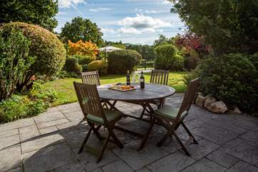 One of the beautiful patio areas. Perfect for enjoying a moment of peace and quiet with a good book. The second patio area is in the background.