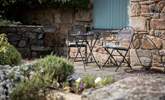 Just outside your door, in the courtyard, you have access to another seating area - perfect for enjoying your morning coffee. - Thumbnail Image