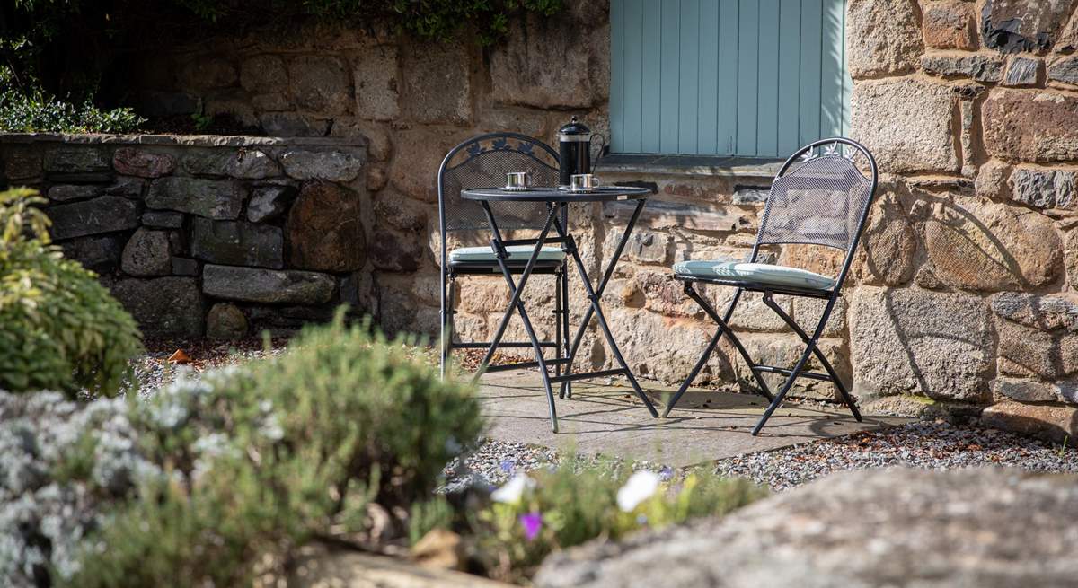 Just outside your door, in the courtyard, you have access to another seating area - perfect for enjoying your morning coffee.