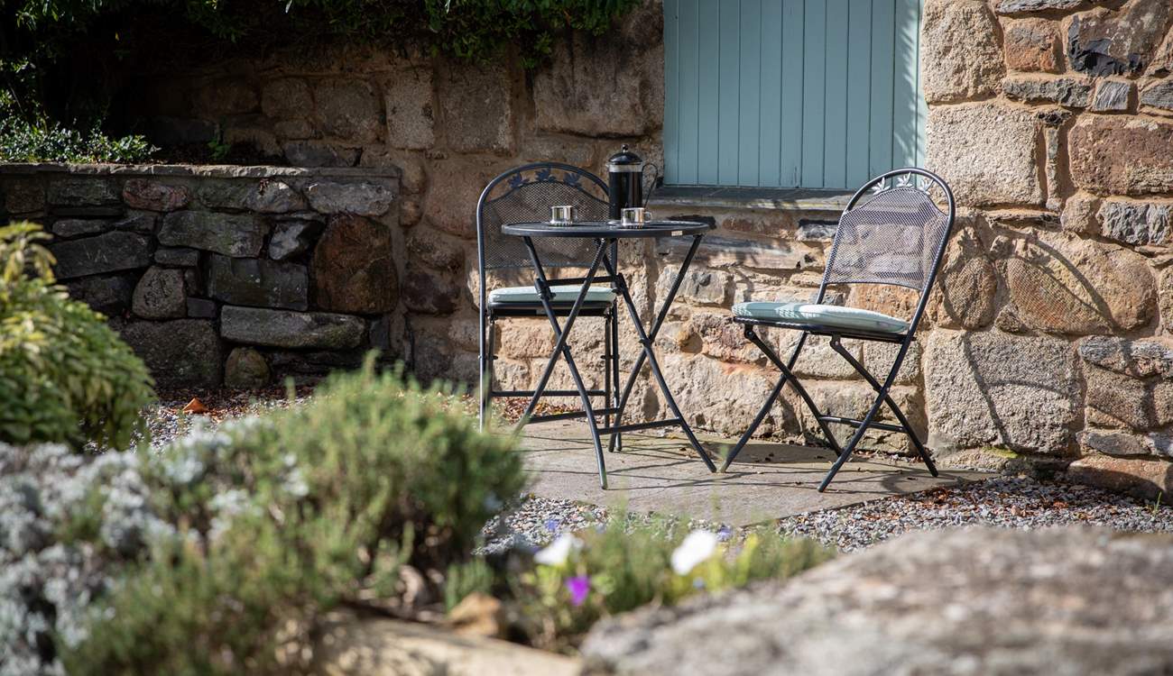 Just outside your door, in the courtyard, you have access to another seating area - perfect for enjoying your morning coffee.