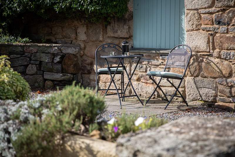 Just outside your door, in the courtyard, you have access to another seating area - perfect for enjoying your morning coffee.