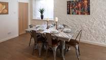Serving up a feast and dining together at this lovely table is a must.