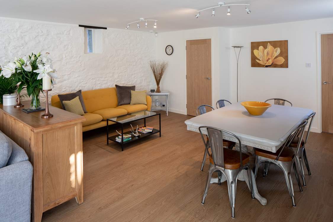 The open plan dining and sitting area.