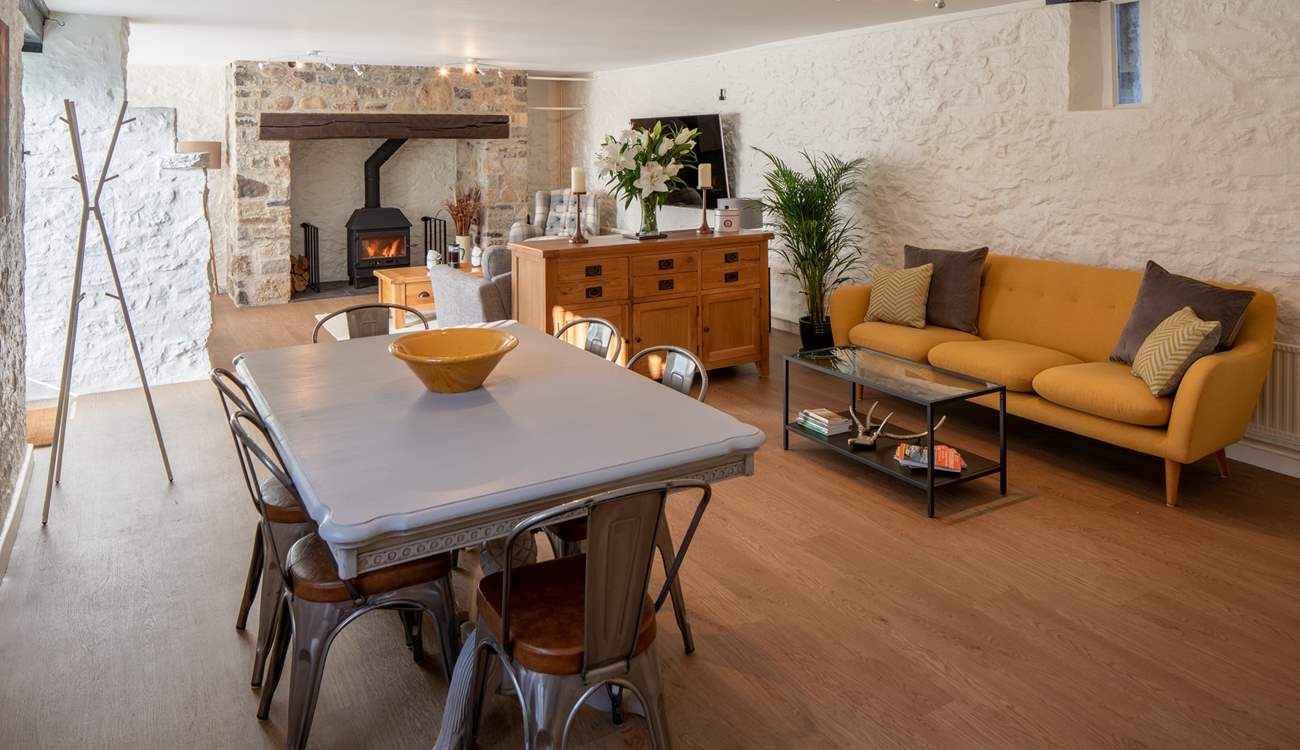 The open plan flow to this beautiful cottage makes it such a warm and welcoming environment.