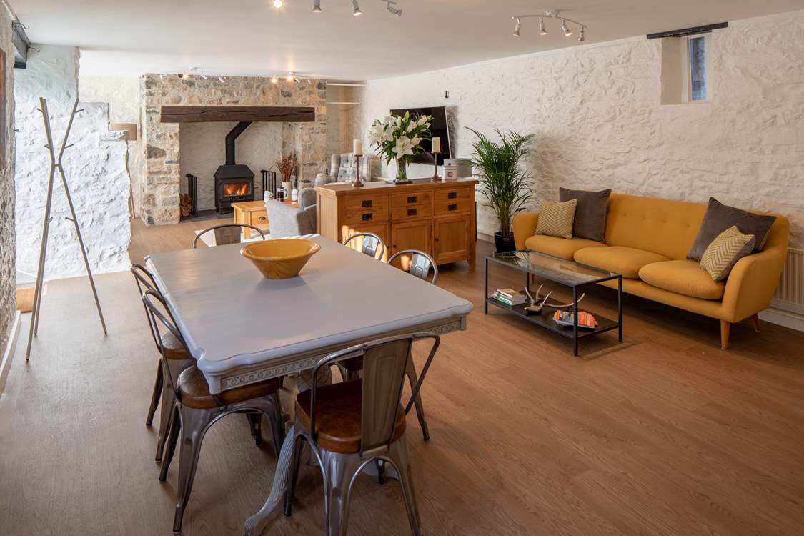 The open plan flow to this beautiful cottage makes it such a warm and welcoming environment.