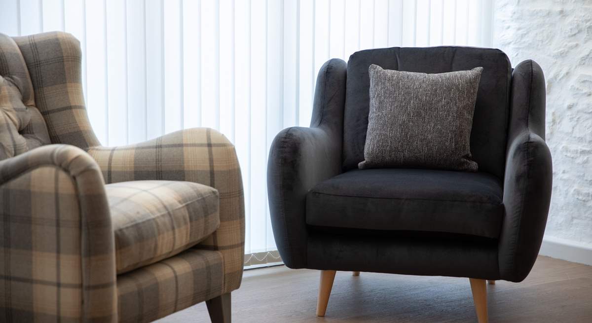 Super comfy armchairs add extra style and comfort.