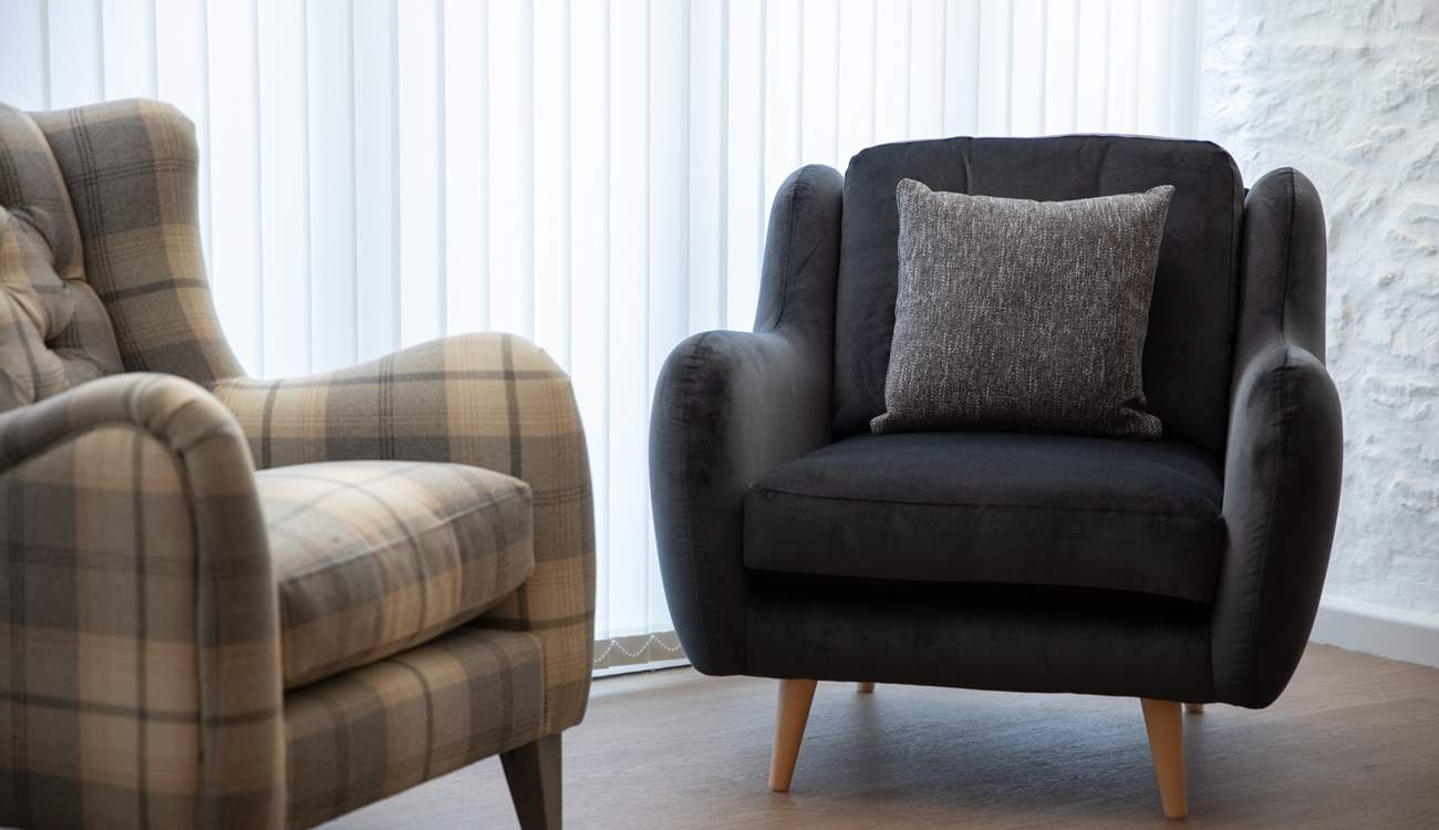 Super comfy armchairs add extra style and comfort.