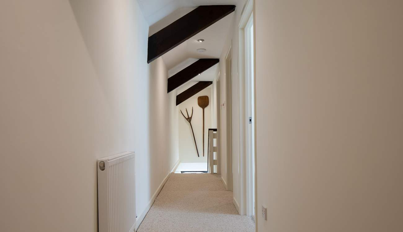 The long landing links the first floor beautifully.