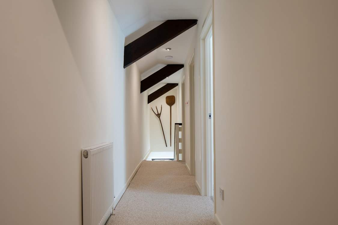 The long landing links the first floor beautifully.
