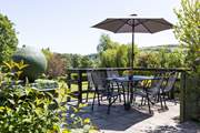 One of the beautiful patio areas. Perfect for enjoying a moment of peace and quiet with a good book.