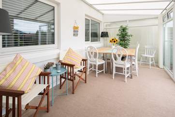 Even if the weather threatens to spoil dining al fresco, you have this wonderful area to retreat to.