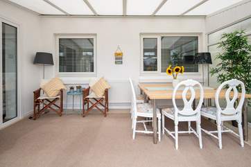 The conservatory is a great place to dine as a family. Sunny, light and airy, a fabulous space.