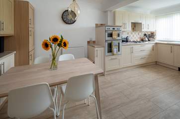 The kitchen offers oodles of space to whip up a feast.