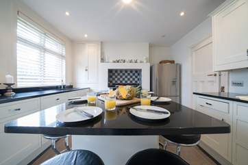 The modern kitchen is well-equipped with the advantage of an Aga.