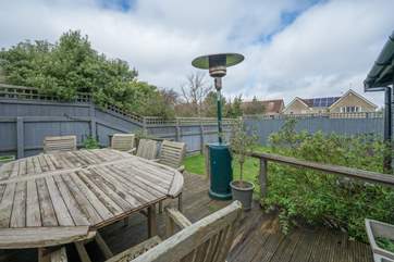 With heaters provided on the decking area, sit back and relax with a drink of your choice in hand.