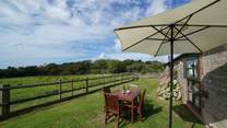 The private garden is enclosed, ideal for children and dogs.