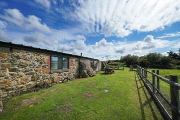 The private enclosed garden is perfect for all times of the day in the Island's sun.