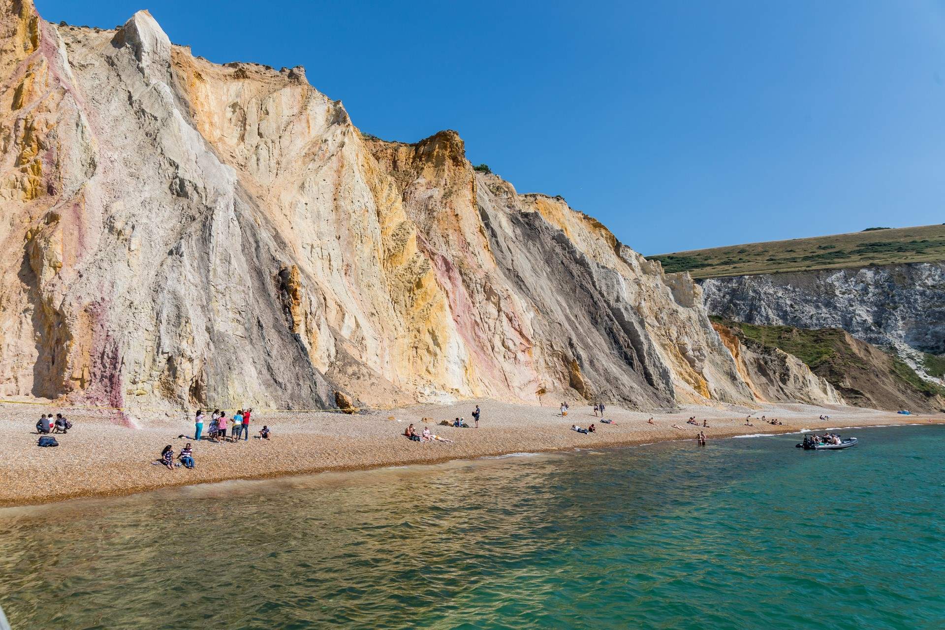 Freshwater Bay is a pebble beach surrounded by chalk cliffs.