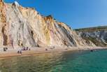Freshwater Bay is a pebble beach surrounded by chalk cliffs.
