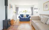 The sitting-room leads out into the garden.  - Thumbnail Image