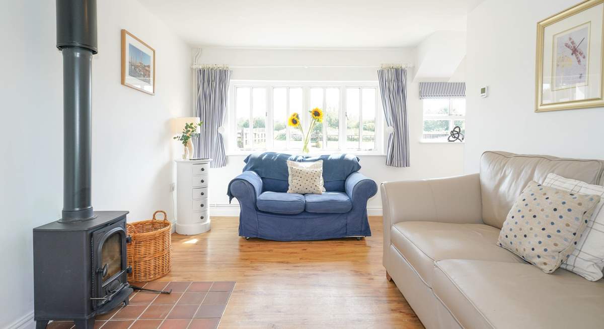 The sitting-room leads out into the garden. 