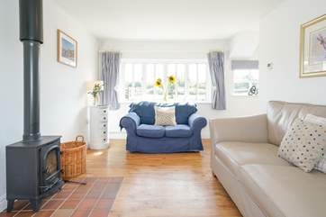 The sitting-room leads out into the garden.