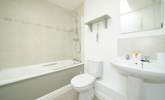 The Jack and Jill bathroom links to the twin bedroom and hallway.  - Thumbnail Image