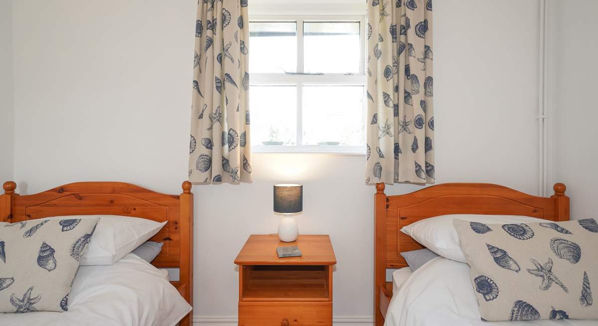 The twin bedroom overlooking the back garden. 