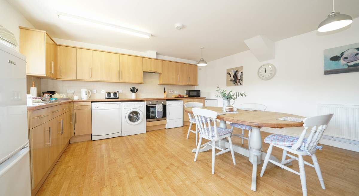 The spacious kitchen/dining-room is well-equipped.  