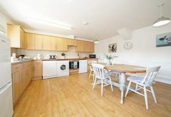The spacious kitchen/dining-room is well-equipped.  