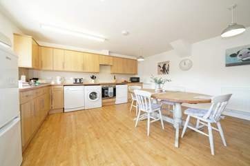 The spacious kitchen/dining-room is well-equipped.