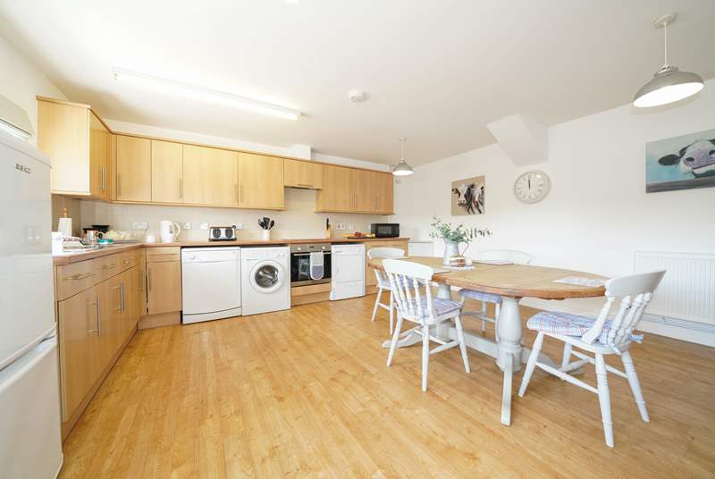 The spacious kitchen/dining-room is well-equipped.  