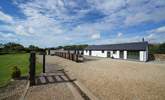 The main driveway and green are shared areas with the other three barns.  - Thumbnail Image