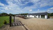 The main driveway and green are shared areas with the other three barns. 