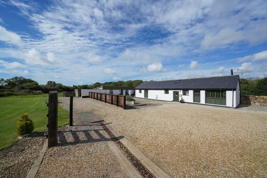 The main driveway and green are shared areas with the other three barns.